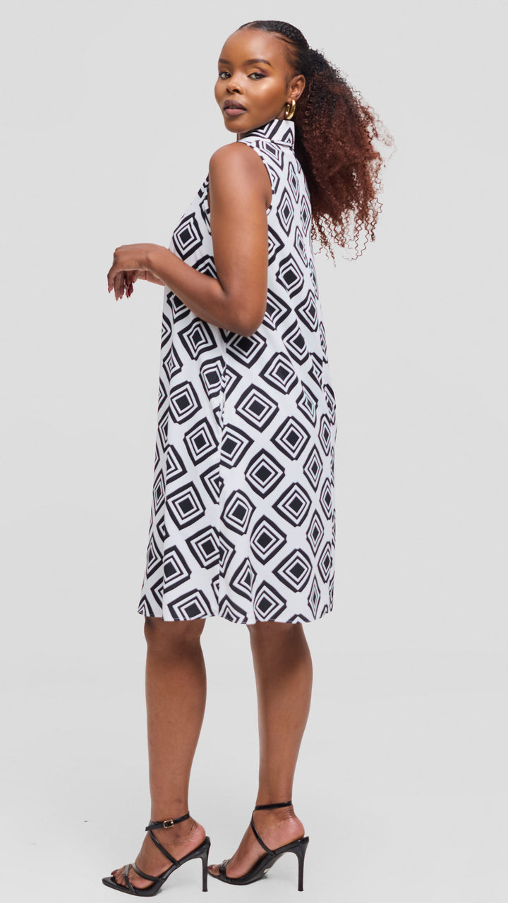 Vivo Asha Sleeveless Knee Length Dress In Crepe - White / Black Tori Print