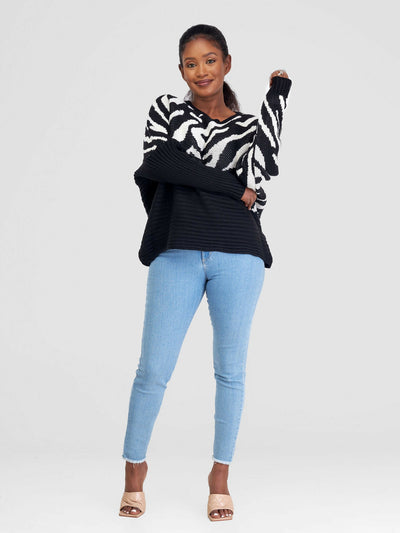 The Fashion Frenzy Zebra Print Sweater Top - Black - Shopzetu
